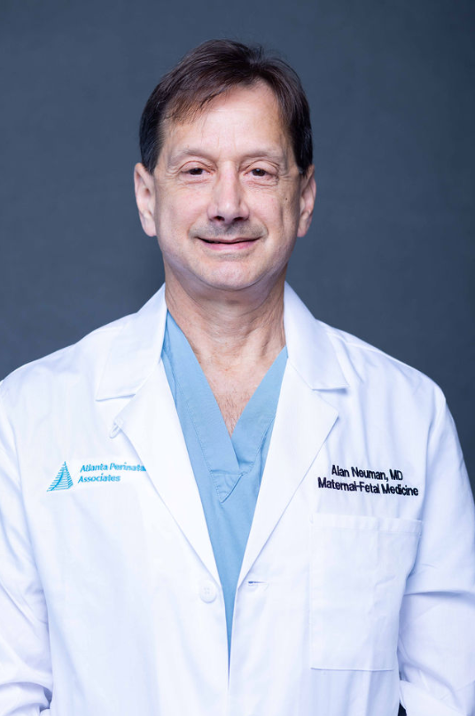 Dr. Alan M. Neuman